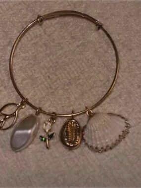 Amazon Gold Charm Bangle Bracelet with White Shells and Green Accent